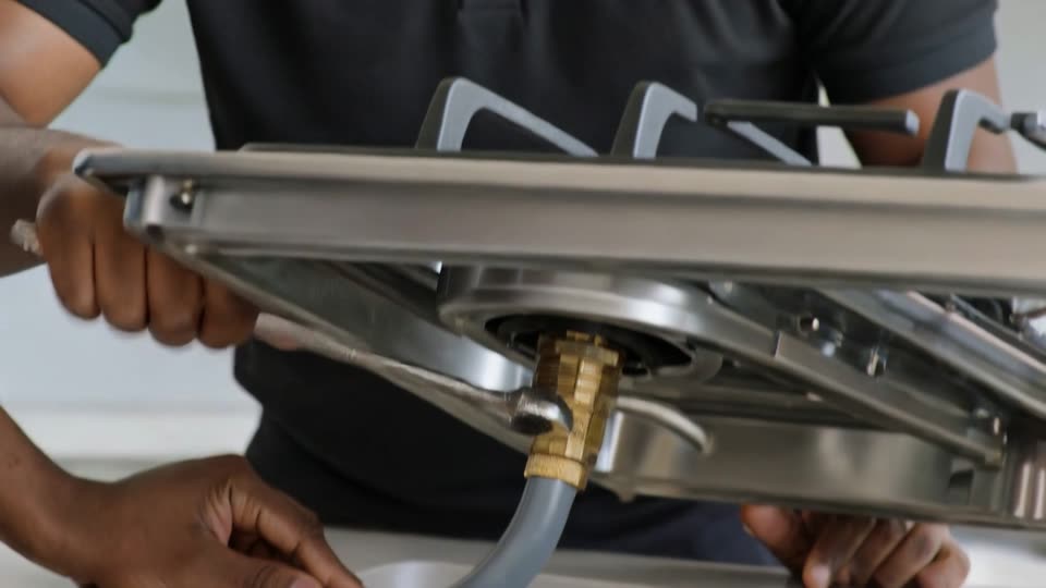 Gas Installers Durban - LPG gas hob connection being made by a registered gas installer